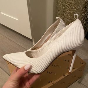 White pointy heels